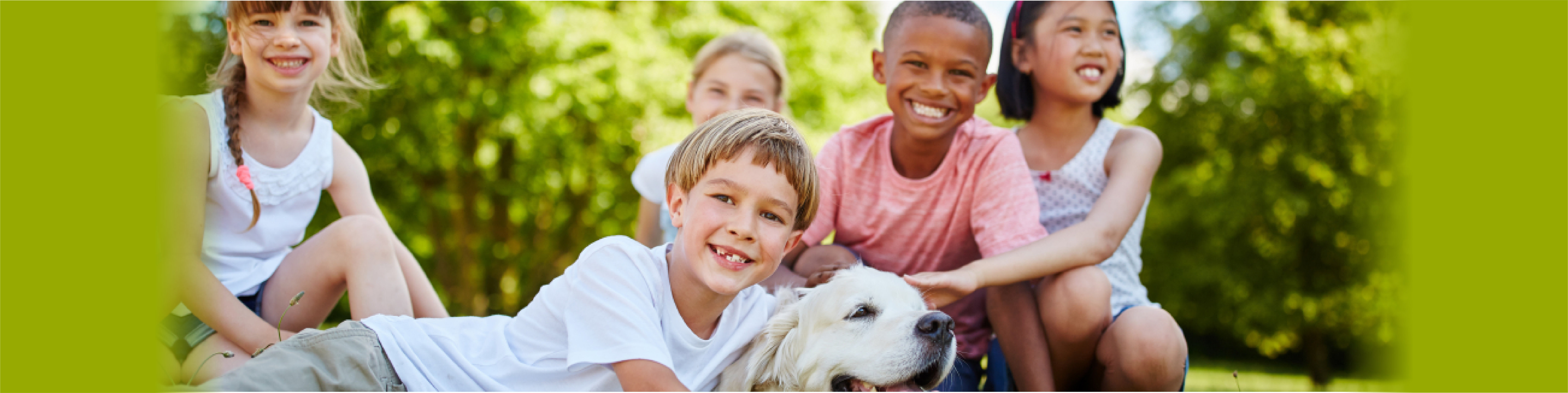 kids and a dog smiling